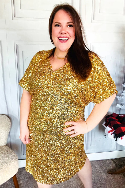 A Gold Sequin Dress